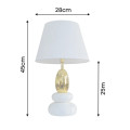 Glamour stoln&aacute; lampa Caillou s dizajnom okruhliakov v bielej farbe so zlat&yacute;m detailom s polohovateľn&yacute;m tienidlom 45 cm