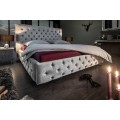 Chesterfield čal&uacute;nen&aacute; siv&aacute; zamatov&aacute; posteľ Kreon I s vysok&yacute;m čelom 210cm
