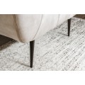 Art deco modern&eacute; kreslo Vermont v kr&eacute;movom champagne čal&uacute;nen&iacute; na čiernych nožičk&aacute;ch 106cm