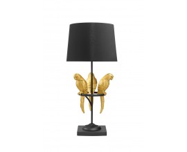 Dizajnov&aacute; glamour stolov&aacute; lampa Macaw s čiernou kon&scaron;trukciou a okr&uacute;hlym tienidlom s dekor&aacute;ciou troch papag&aacute;jov v zlatej farbe na obruči