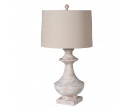 Dizajnov&aacute; stoln&aacute; lampa Trophy s okr&uacute;hlym tienidlom z ľanovej text&iacute;lie a vyrez&aacute;vanou podstavou zo živice s vintage efektom vymytej farby v b&eacute;žovom preveden&iacute;