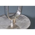 Art deco okr&uacute;hly strieborn&yacute; kovov&yacute; pr&iacute;ručn&yacute; stol&iacute;k Zendy s glamour n&aacute;dychom 60 cm