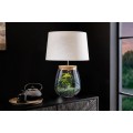 &Scaron;t&yacute;lov&aacute; sklenen&aacute; stoln&aacute; lampa Clasico s nohou v podobe priesvitnej n&aacute;doby s valcov&yacute;m b&eacute;žov&yacute;m tienidlom 60 cm