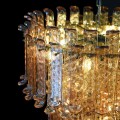 Luxusn&yacute; glamour okr&uacute;hly trojstupňov&yacute; z&aacute;vesn&yacute; luster Melinda v medenej farbe so sklenen&yacute;m tienidlom a kovovou kon&scaron;trukciou 88 cm