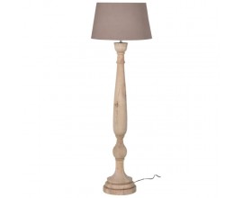 Dizajnov&aacute; mas&iacute;vna vidiecka stojaca lampa Saturn s nohou z mangov&eacute;ho dreva v svetlej hnedej farbe s vyrez&aacute;van&iacute;m a kužeľov&yacute;m tienidlom v hnedej farbe z ľanu