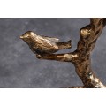 Dizajnov&yacute; vintage asymetrick&yacute; pr&iacute;ručn&yacute; stol&iacute;k Avian v starožitnej medenej farbe s dizajnom listov a vt&aacute;kov 62 cm