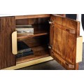 Luxusn&yacute; art deco ov&aacute;lny &scaron;tvordverov&yacute; TV stol&iacute;k Gatsby z hned&eacute;ho mas&iacute;vu s dr&aacute;žkovan&yacute;m reli&eacute;fom a bielou mramorovou doskou 170 cm