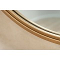 Art deco okr&uacute;hle zrkadlo Auri so zlat&yacute;m tenk&yacute;m kovov&yacute;m r&aacute;mom a zadnou v&yacute;stužou z dyhovan&eacute;ho dreva na stenu 80 cm