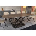 Modern&yacute; ov&aacute;lny rozkladac&iacute; st&ocirc;l Lutz s keramickou doskou v hrdzavej hnedej farbe a kovovou prekr&iacute;ženou podstavou 190 cm
