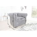 Vintage siv&eacute; kreslo Chesterfield Grau s ozdobn&yacute;m pre&scaron;&iacute;van&iacute;m s okr&uacute;hlymi gomb&iacute;kmi a poťahom s efektom vintage kože 105 cm