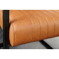 Industri&aacute;lna jed&aacute;lensk&aacute; stolička Inspirativo s retro hned&yacute;m koňakov&yacute;m kožen&yacute;m poťahom a čiernou konzolovou kon&scaron;trukciou 88 cm
