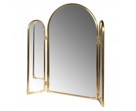 Dizajnov&eacute; art deco zrkadlo Avella s kovov&yacute;m r&aacute;mom v zlatej farbe s obl&uacute;kom vo vrchnej časti s dvomi už&scaron;&iacute;mi pohybliv&yacute;mi skladac&iacute;mi bočn&yacute;mi panelmi s obl&uacute;kmi
